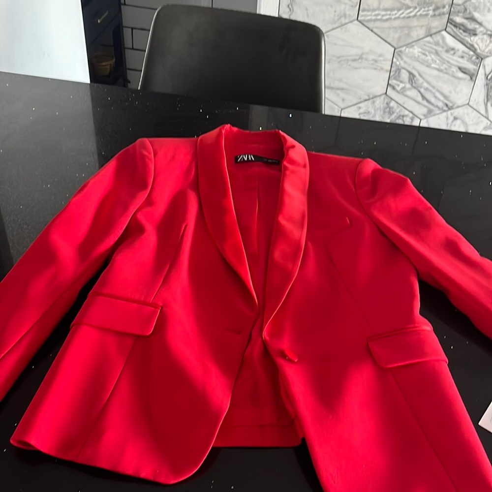 Red Taylor fitted suit